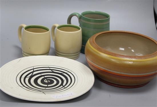 A Susie Cooper Crown Works plate, a hand signed vase, three mugs and a bowl